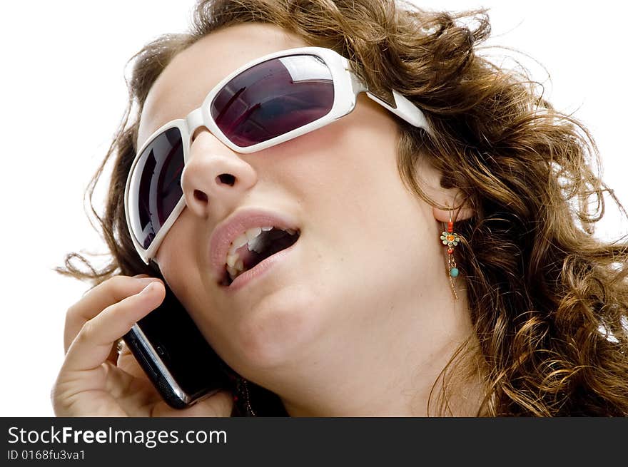 Female talking on cell phone on an isolated background