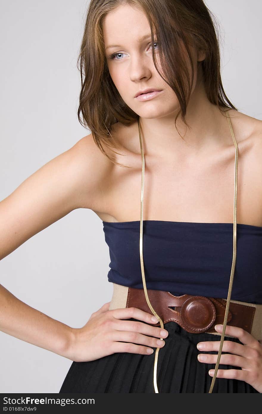 Portrait of young beautiful woman on white background