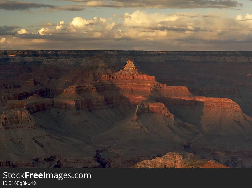 View of the Grand Canyon from the South Rim. The Setting sun has cast long shadows. View of the Grand Canyon from the South Rim. The Setting sun has cast long shadows.