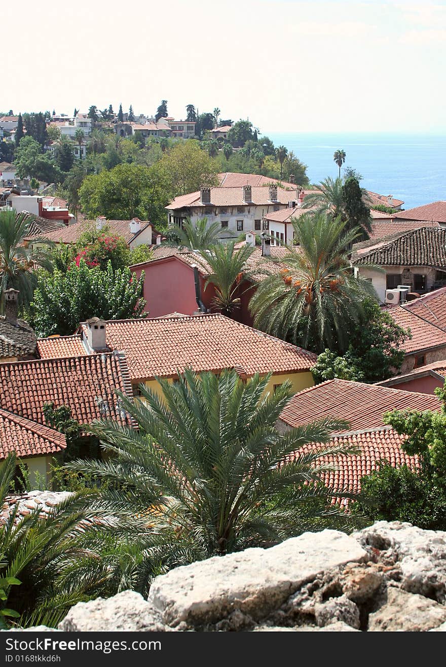 View on roofs of the old town of Antalya with seaside.