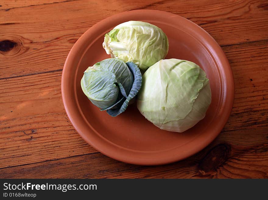 Cabbage on a brown plate