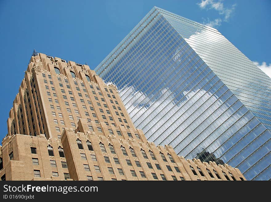 Image captures two office buildings in New York City. Image captures two office buildings in New York City.