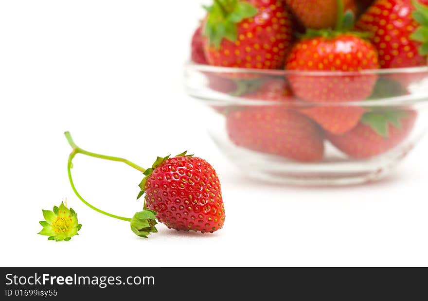 High key photo of fruit dish filled with nice red strawberries. High key photo of fruit dish filled with nice red strawberries