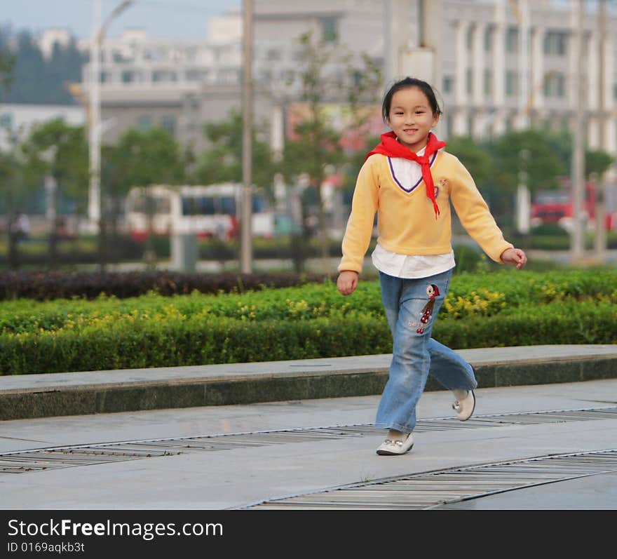 The walking girl in a park . The walking girl in a park .