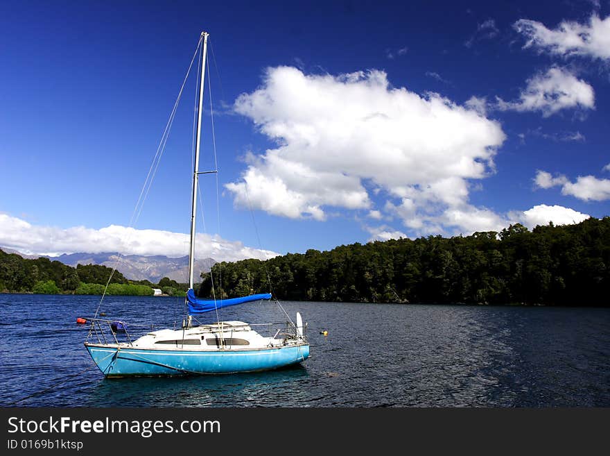 Sailing boat in lake Manapouri New Zealand, . Sailing boat in lake Manapouri New Zealand,