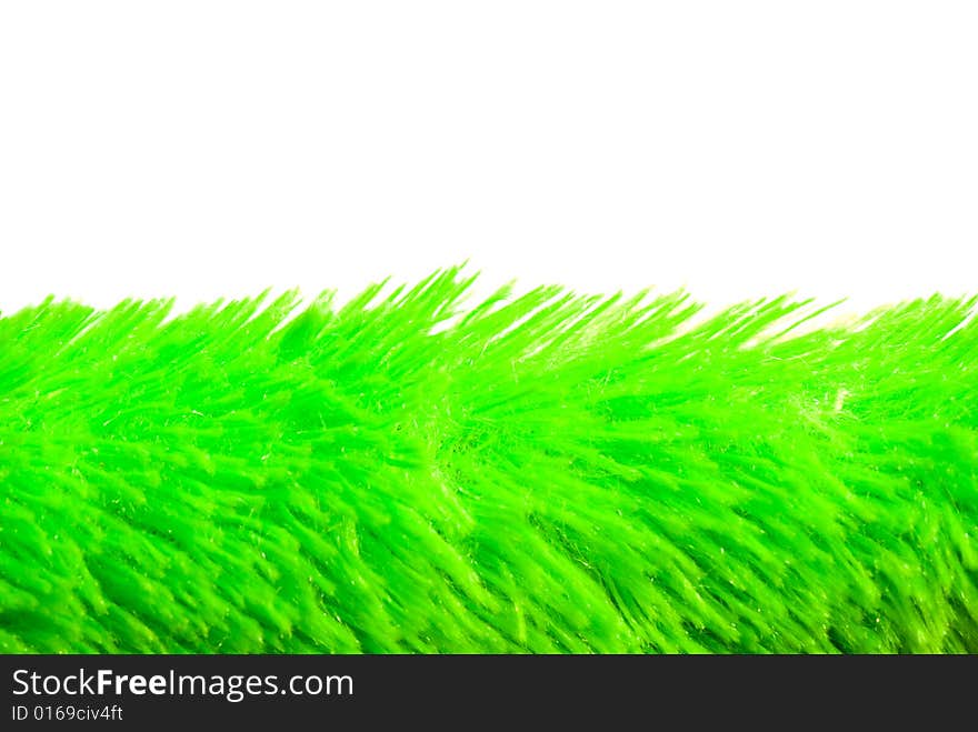 Artificial soft grass on a white background