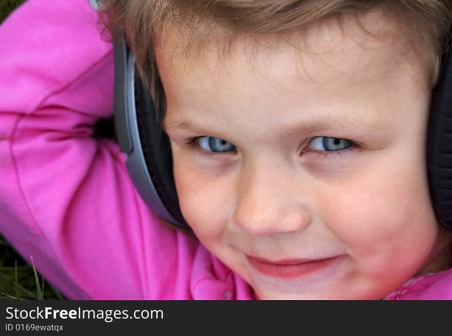 Young girl listening to music