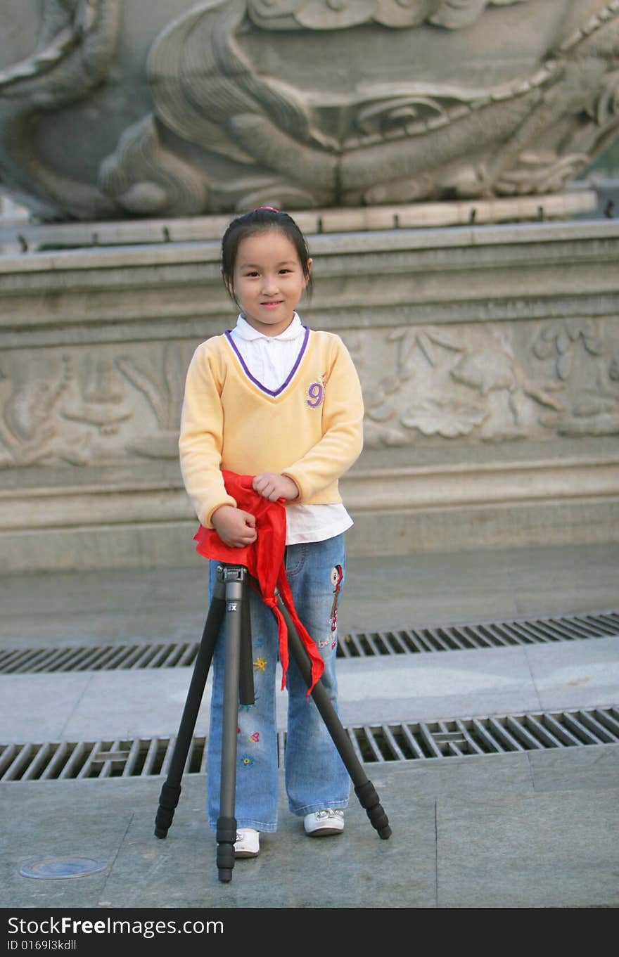 The asian  girl in a park . The asian  girl in a park .