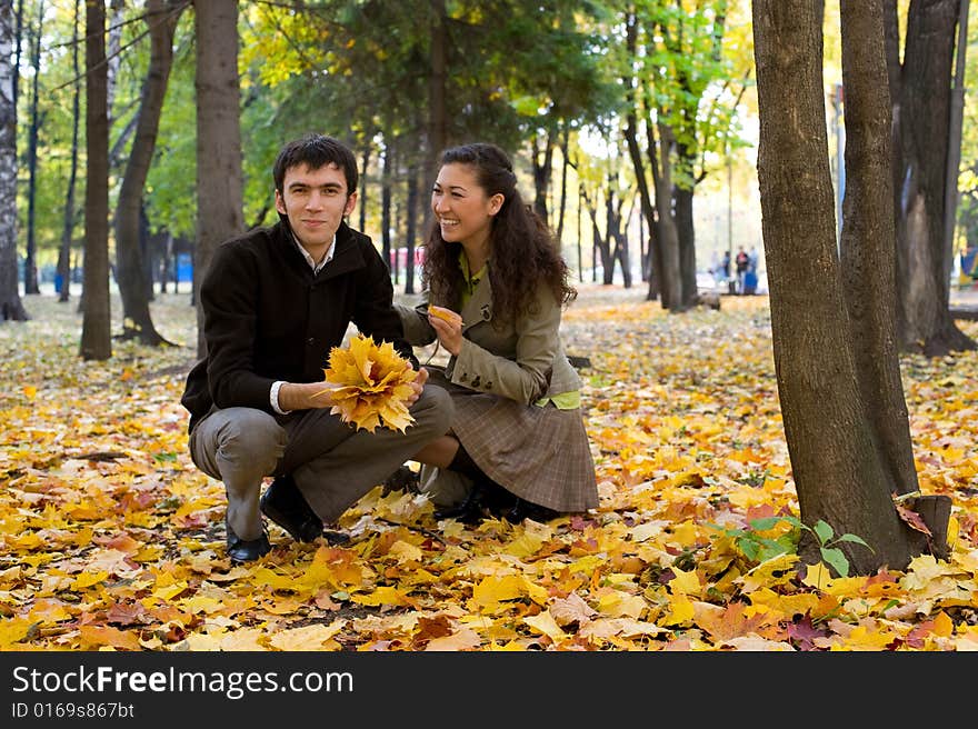 Moment of love. Young beautiful couple have fun In autumn outdoors