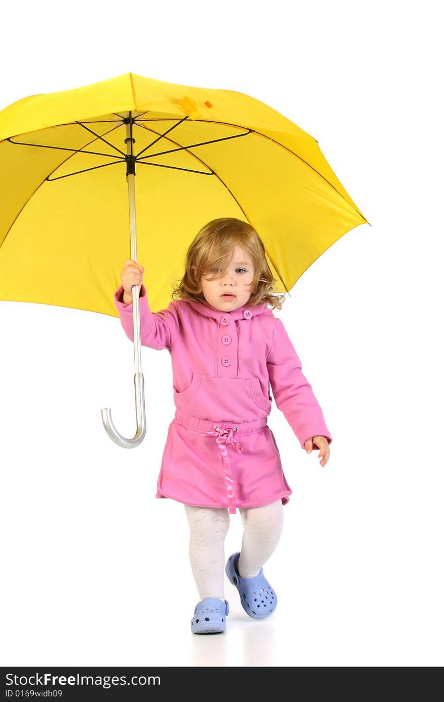 Beauty a little girl with yellow umbrella