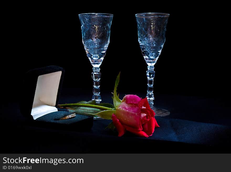 Rose, engagement ring and flutes. Rose, engagement ring and flutes