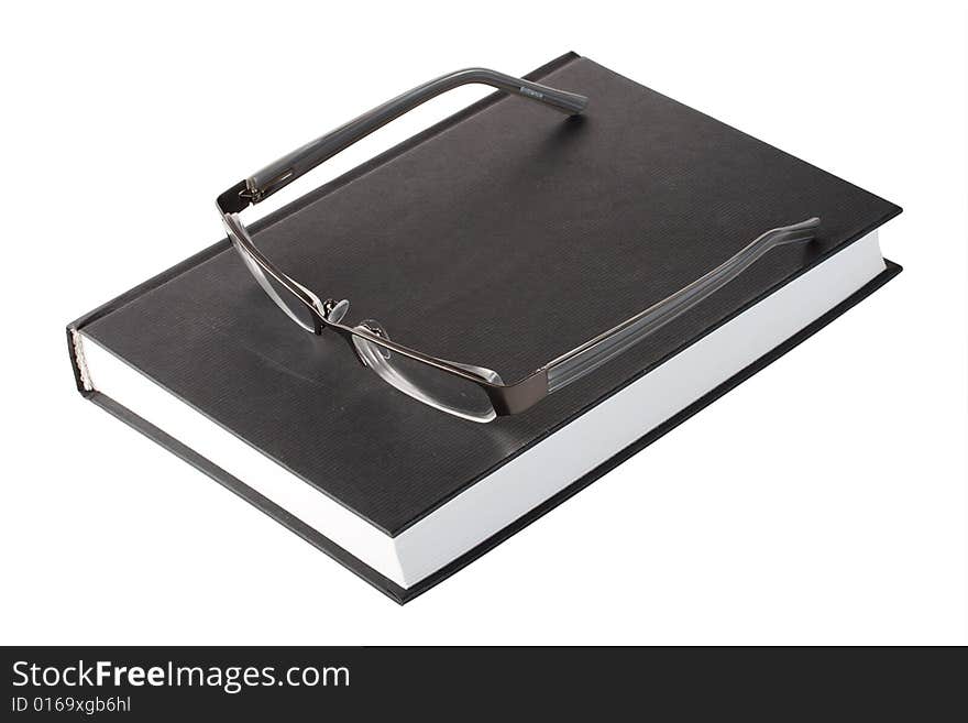 Glasses on a book