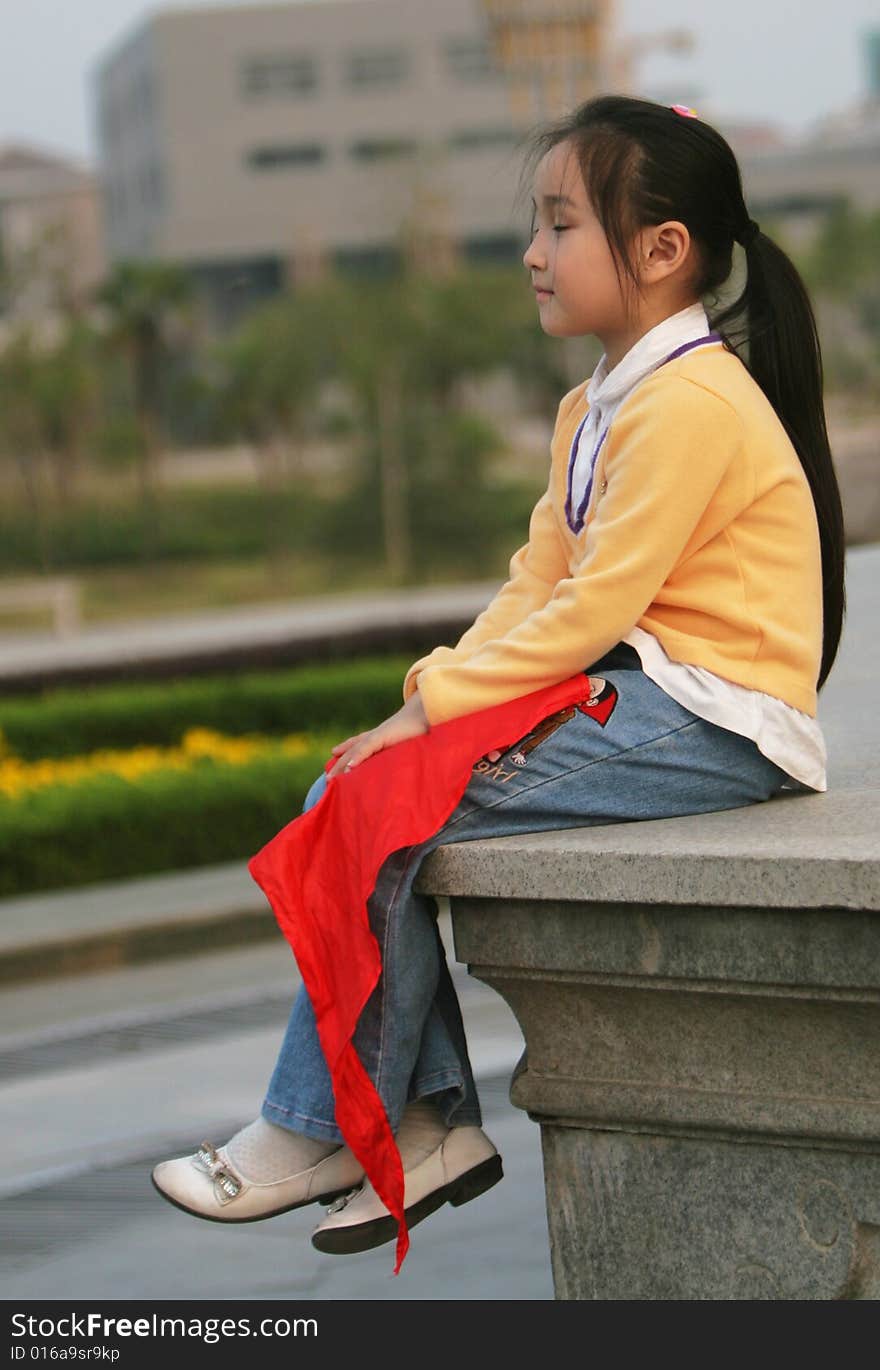 The asian  girl in a park . The asian  girl in a park .