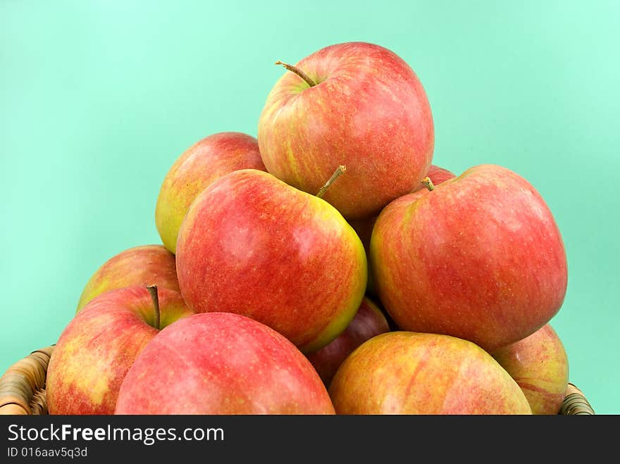 Harvesting. A basket with red ripe apples..