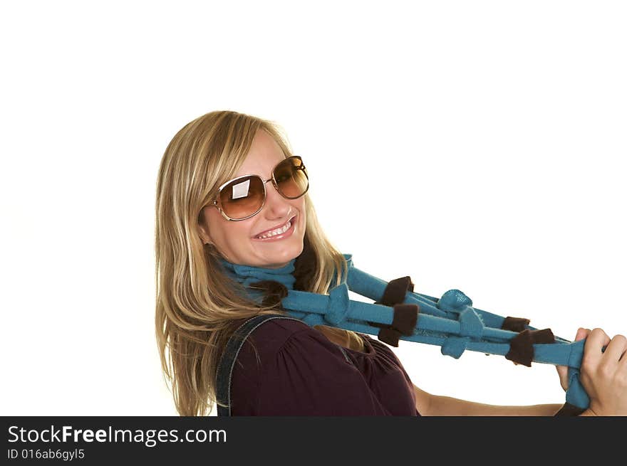 Horizontal portrait of a pretty blond wearing a scarf, and sunglasses. Horizontal portrait of a pretty blond wearing a scarf, and sunglasses