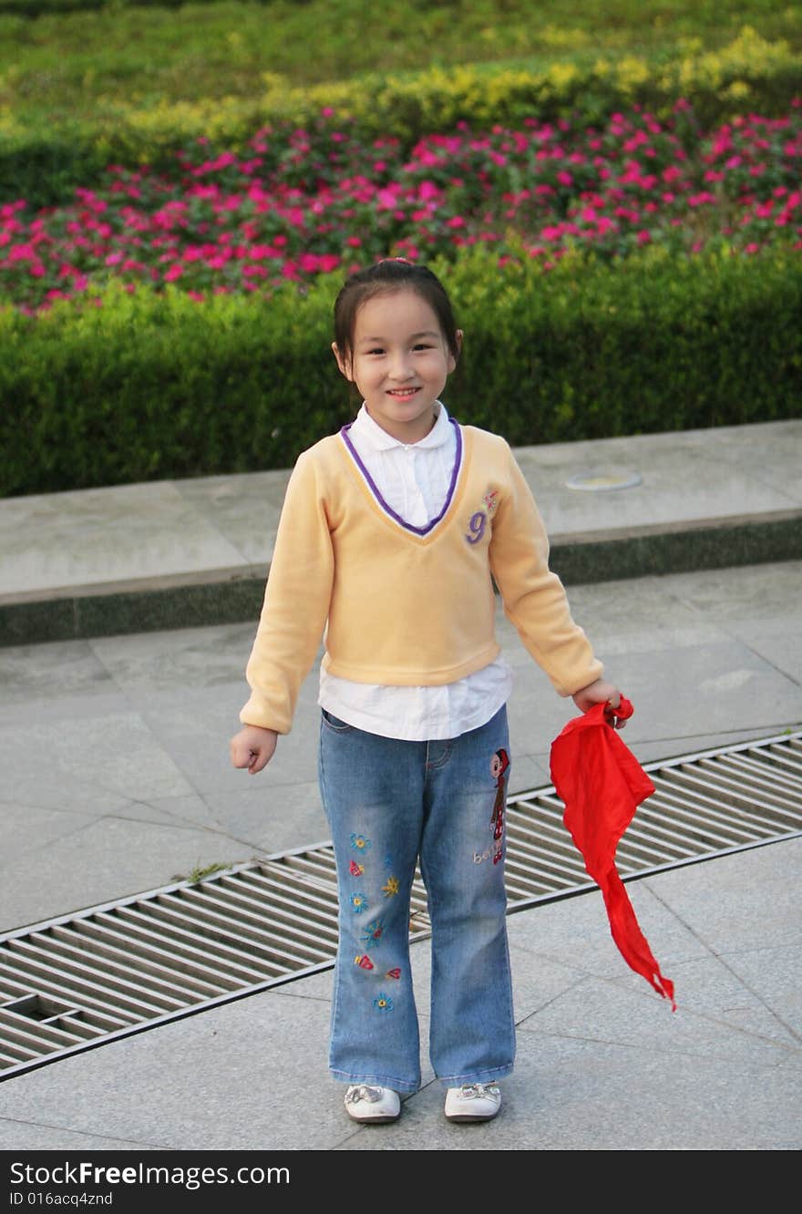 The asian  girl in a park . The asian  girl in a park .