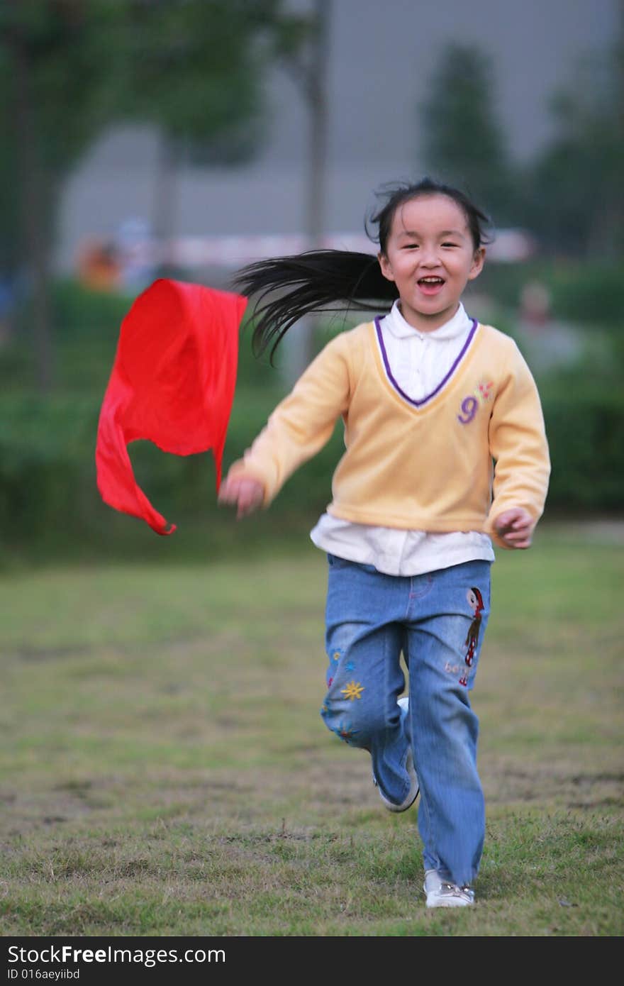 The running girl in a park .