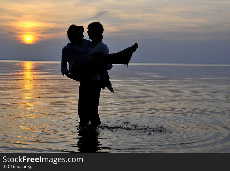 Romantic couple at sunset