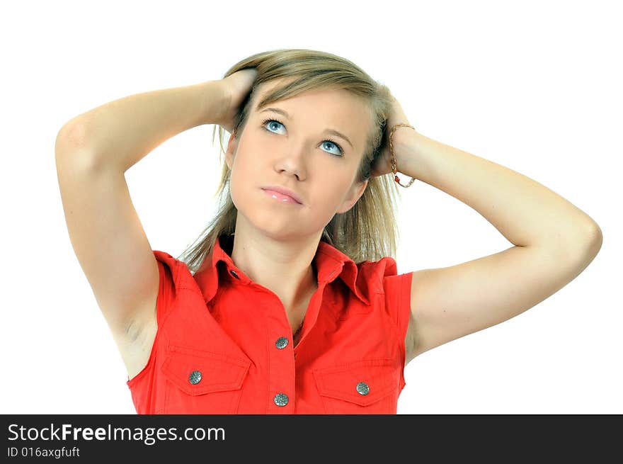 Pretty young girl corrects hairstyle