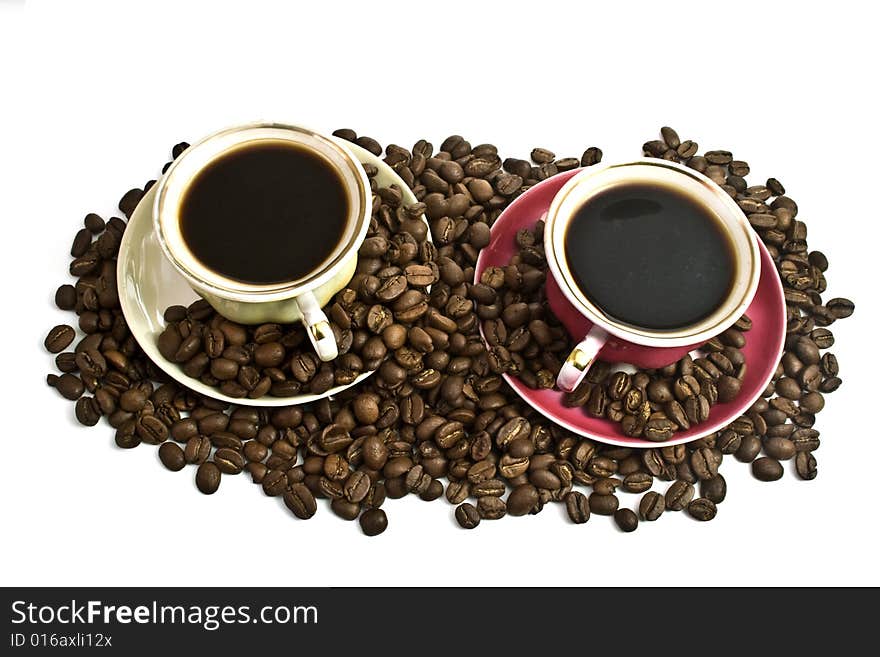 Coffee in cups on a white background. Coffee in cups on a white background