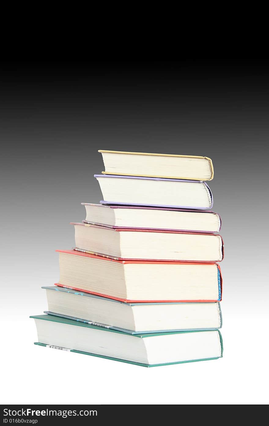 Isolated books standing on gradient background