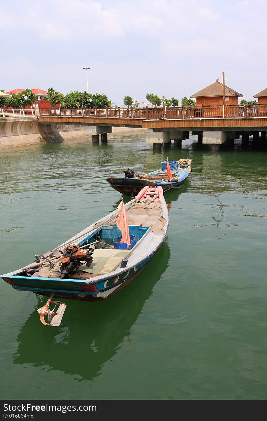 Two little old fishing boat park by beach. Two little old fishing boat park by beach.