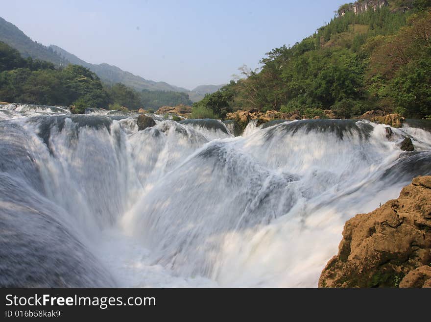 Waterfall In Mountain