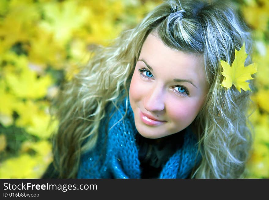 Young woman in autumn forest