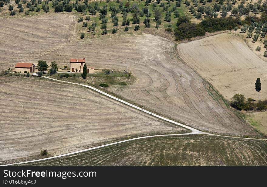 Tuscan landscape Valle d'Orcia, italy, isolated farm surronded by fields. Tuscan landscape Valle d'Orcia, italy, isolated farm surronded by fields