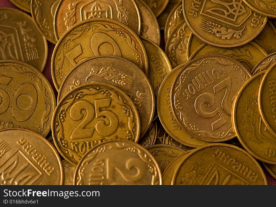 Different coins of Ukraine on a white background