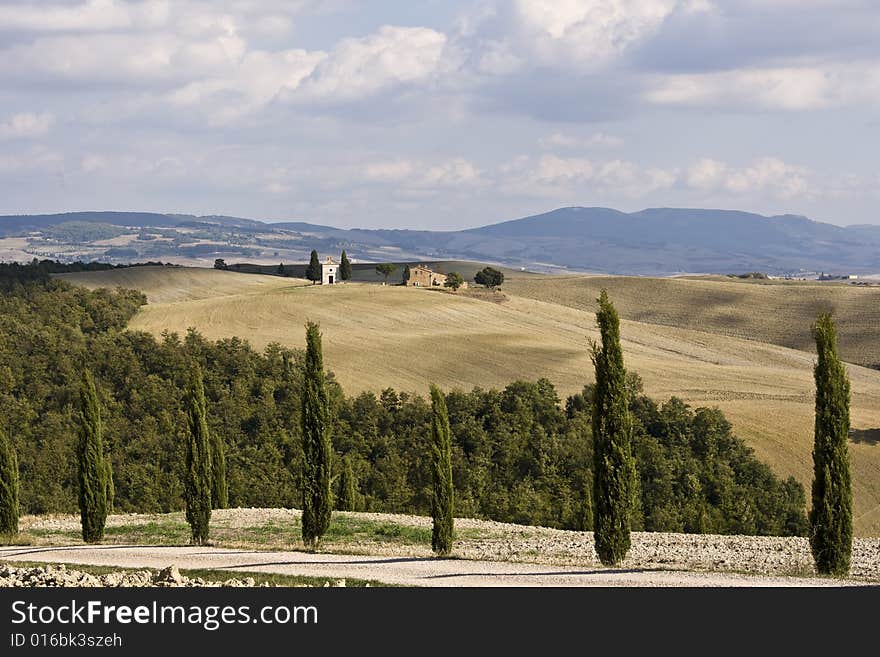 Tuscan landscape Valle d'Orcia, italy, isolated farm with cypress. Tuscan landscape Valle d'Orcia, italy, isolated farm with cypress