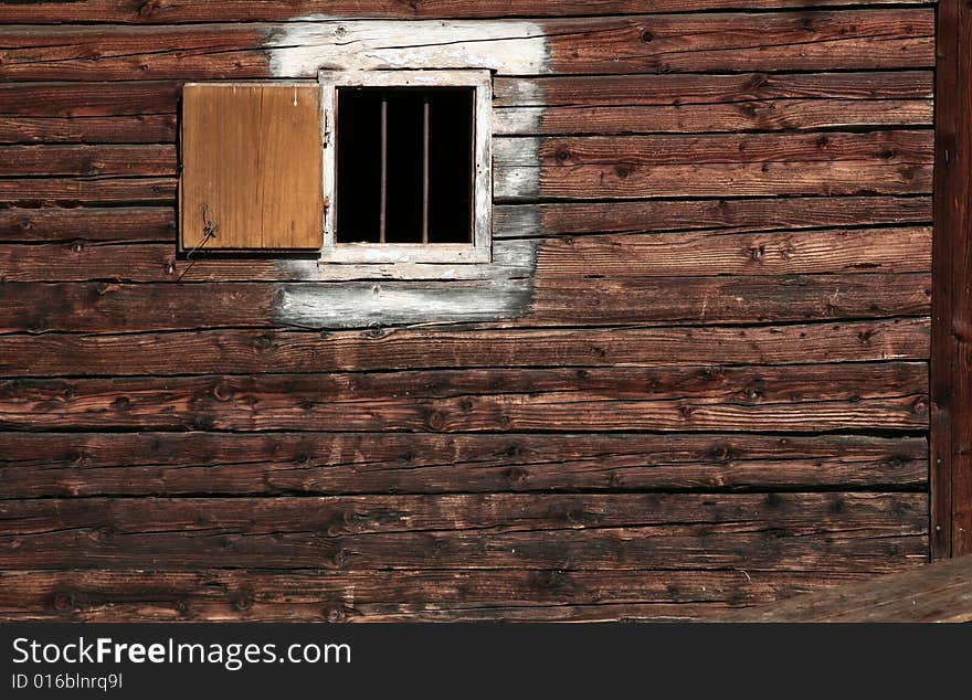 A farmhouse texture with a small window