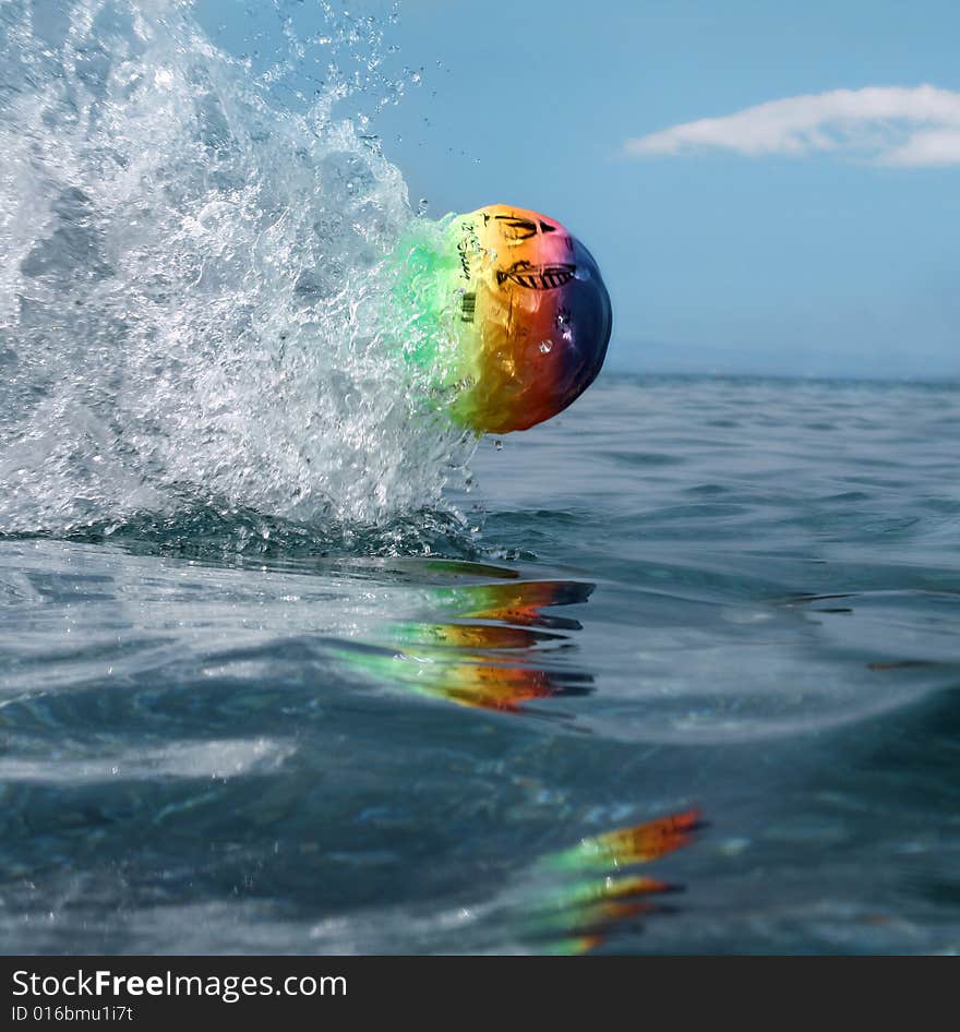 A ball flying in the water surface. A ball flying in the water surface