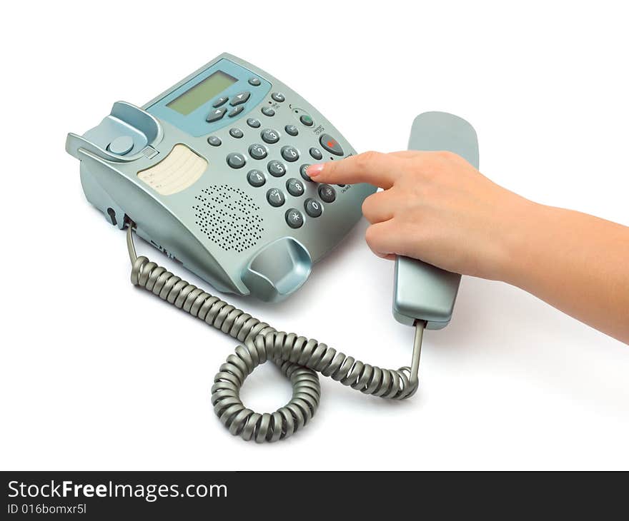 Telephone and woman hand isolated on white background. Telephone and woman hand isolated on white background