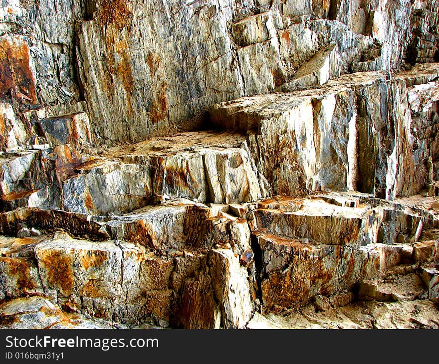 Macro photography of a rock face, ideal for backgrounds. Macro photography of a rock face, ideal for backgrounds.