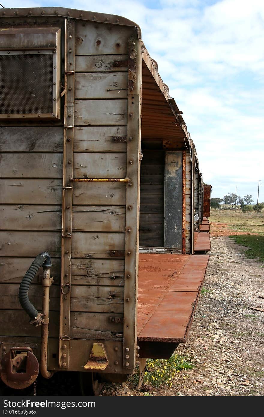 Old rusted train coaches abandoned in the country side. Old rusted train coaches abandoned in the country side