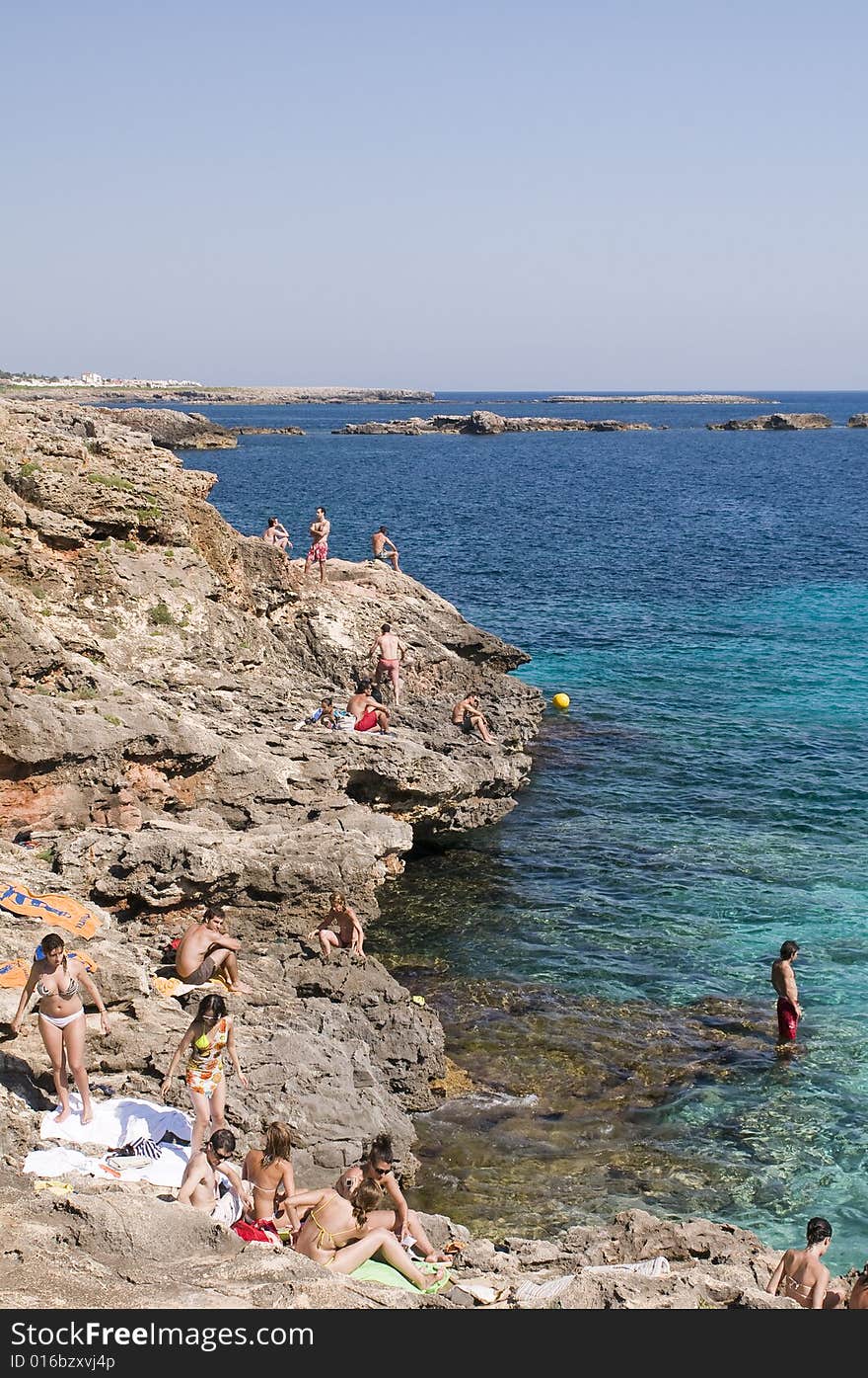 People jumping off cliffs and boat to swim. People jumping off cliffs and boat to swim