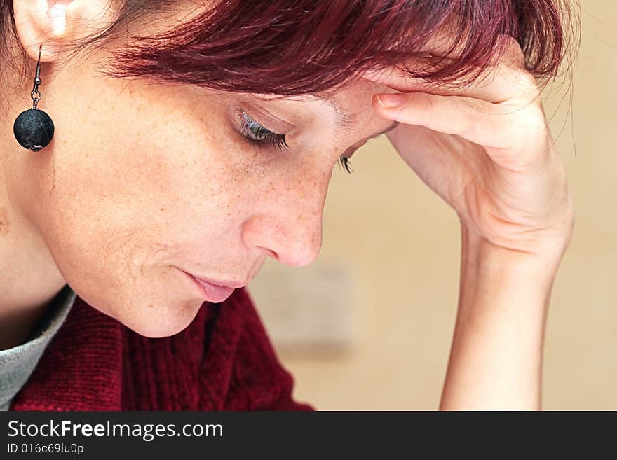 The woman closely studying the literature. The woman closely studying the literature