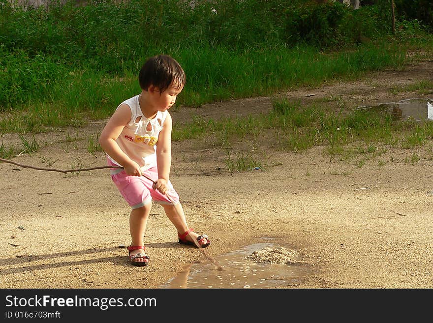 A lovely Chinese children to play outdoors. A lovely Chinese children to play outdoors.