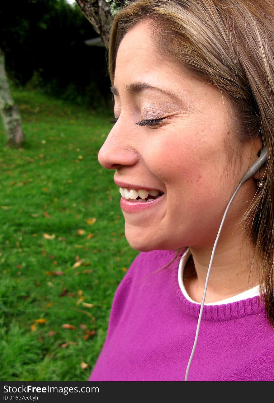 Beautiful girl portrait looking happy on the nature. Beautiful girl portrait looking happy on the nature