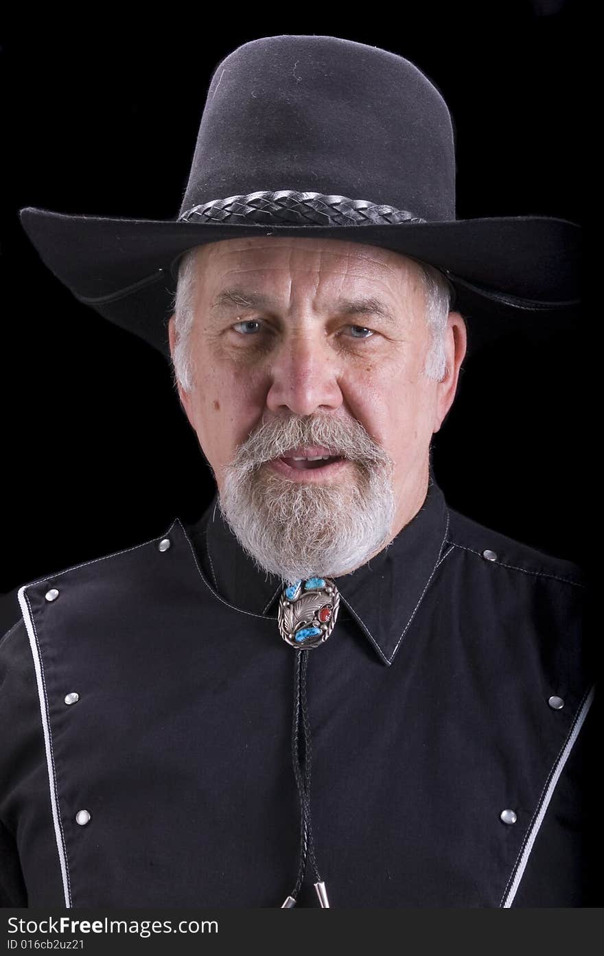 Handsome olld baby-boomer Cowboy dressed in black and looking like Buffalo Bill Cody. Handsome olld baby-boomer Cowboy dressed in black and looking like Buffalo Bill Cody