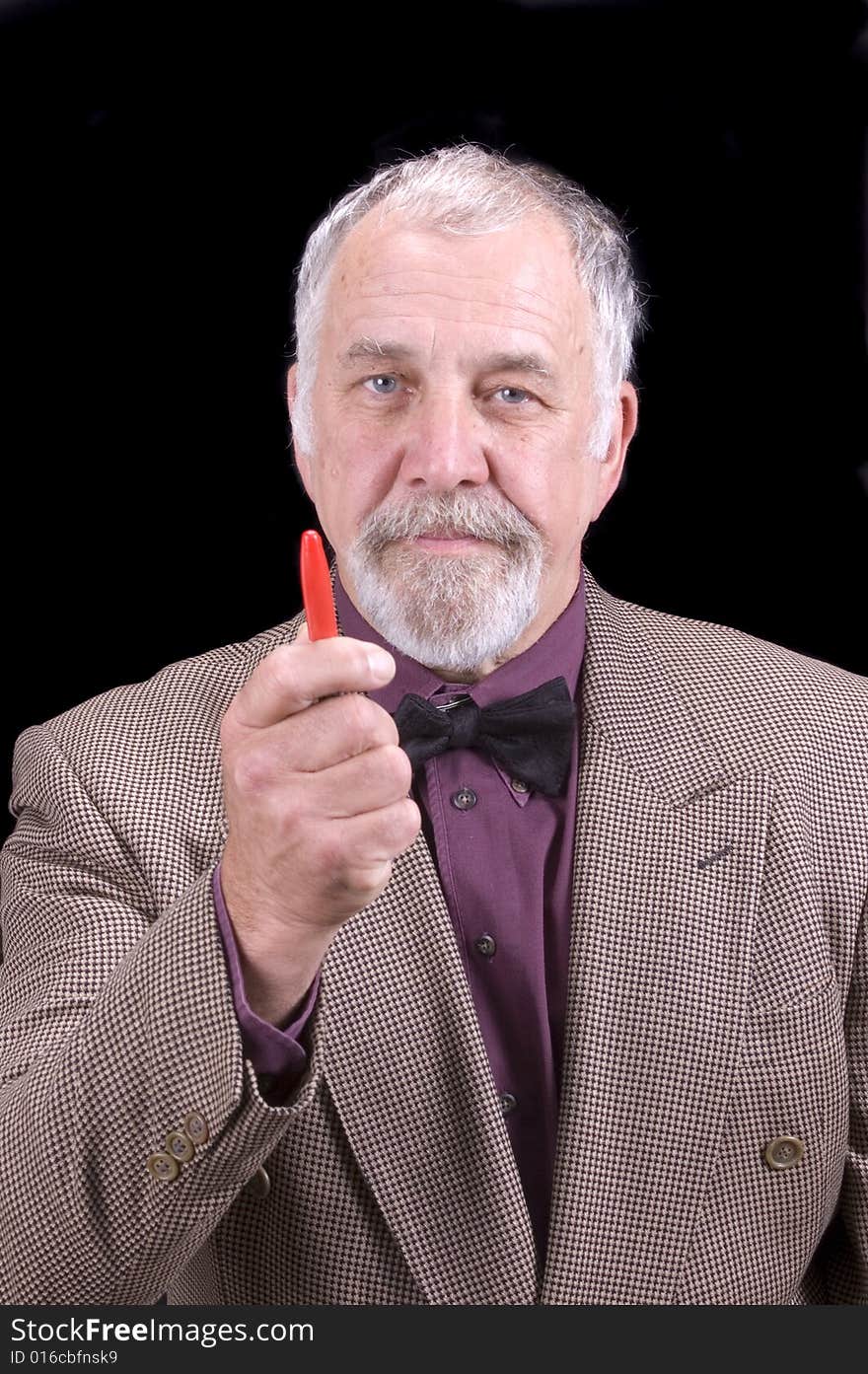 Older businessman or professor in a sports coat isolated on black