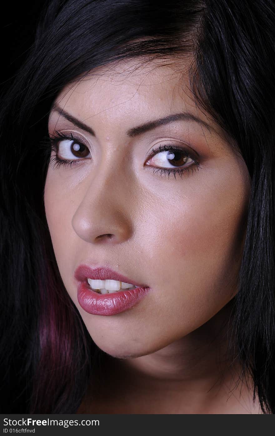 Beautiful hispanic young woman in closeup