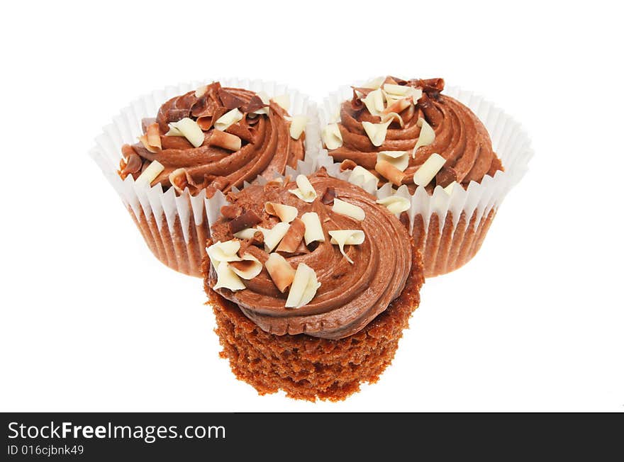 Three chocolate cup cakes