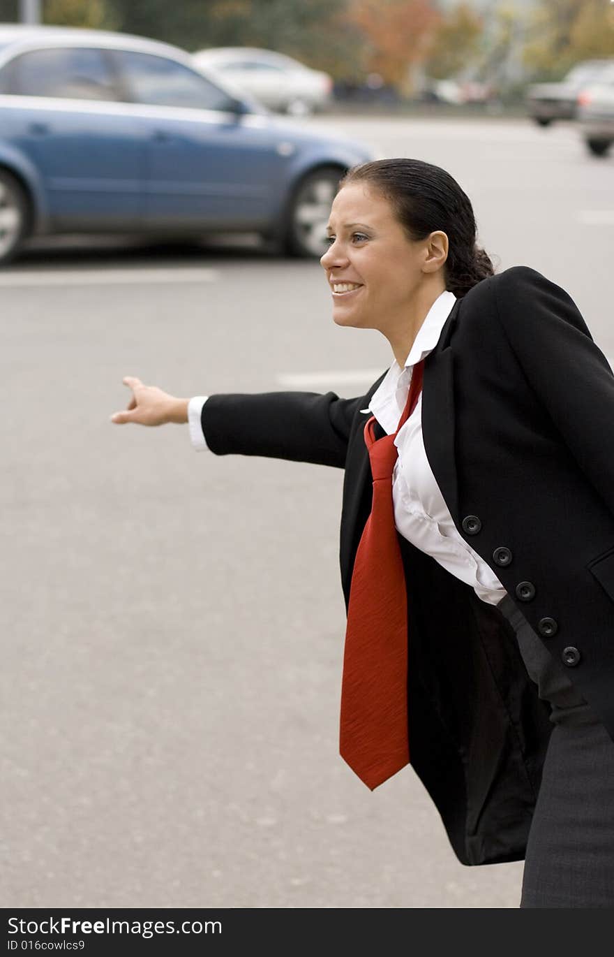 Hitchhiking businesswoman