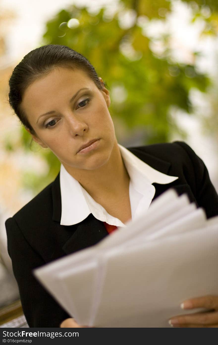 Attractive businesswoman with documents