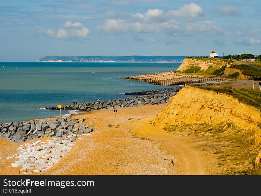 The View from Galley Hill to Beachy head is stunning on a clear day the Sandy cliffs of Bexhill with the Observation post where the late Goon Spike Milligan started his Military escapades in the Second World War is in the Foreground. The View from Galley Hill to Beachy head is stunning on a clear day the Sandy cliffs of Bexhill with the Observation post where the late Goon Spike Milligan started his Military escapades in the Second World War is in the Foreground.