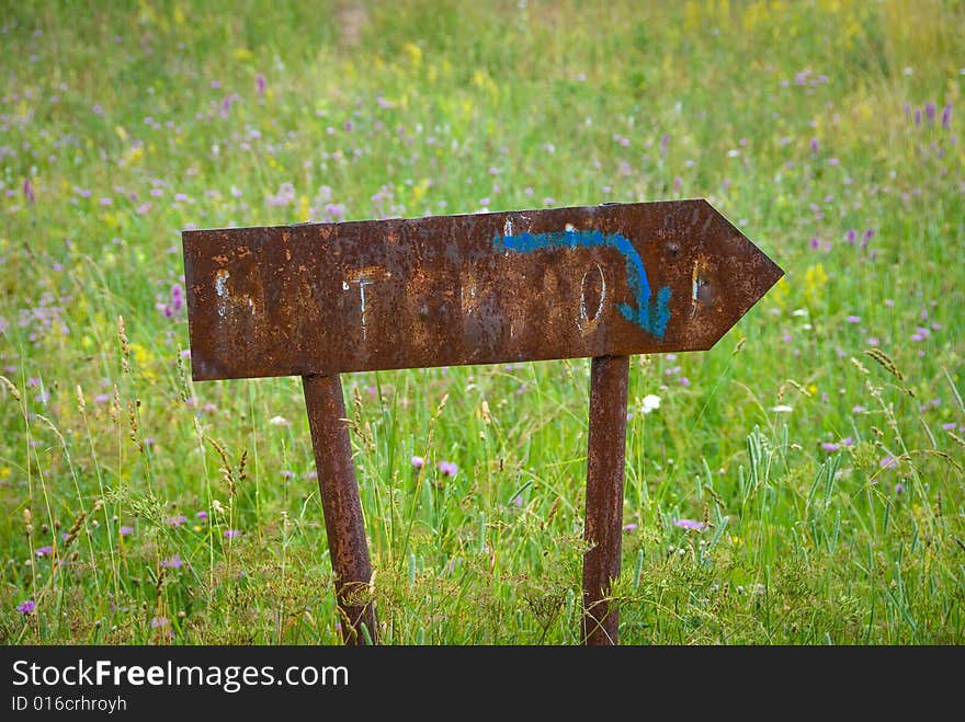 Rusty direction sign on a nature. You can write your text on it. Rusty direction sign on a nature. You can write your text on it.