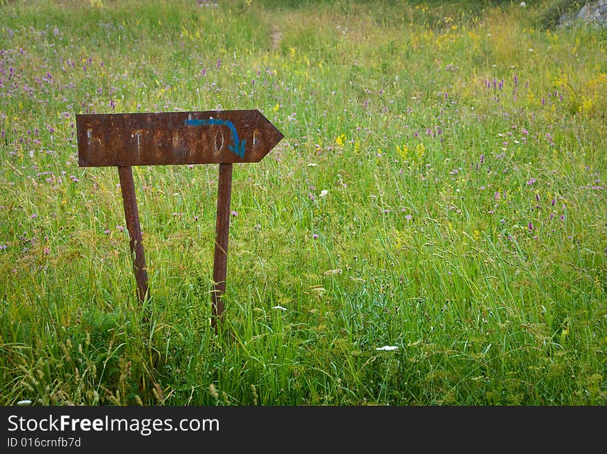 Rusty direction sign on a nature. You can write your text on it. Rusty direction sign on a nature. You can write your text on it.