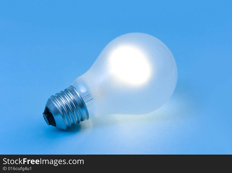 Lighting Lamp On Blue Background